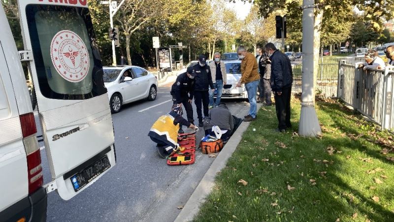 Otomobilin çarptığı kadının üzerine montunu örttü