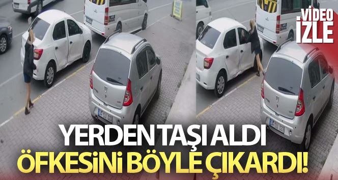 Eşiyle tartıştı, öfkesini arabasından çıkardı: O anlar güvenlik kamerasında