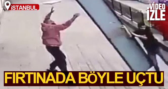 Fırtınada yardıma gitti, tabela ile birlikte uçtu