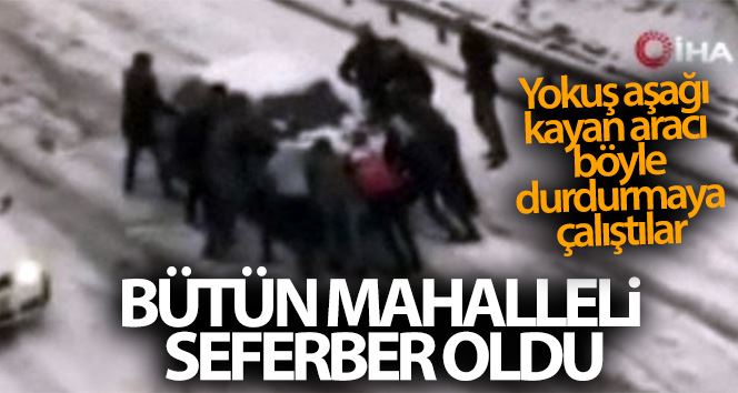 Esenyurt’ta mahalleli yokuş aşağı kayan aracı durdurmak için seferber oldu