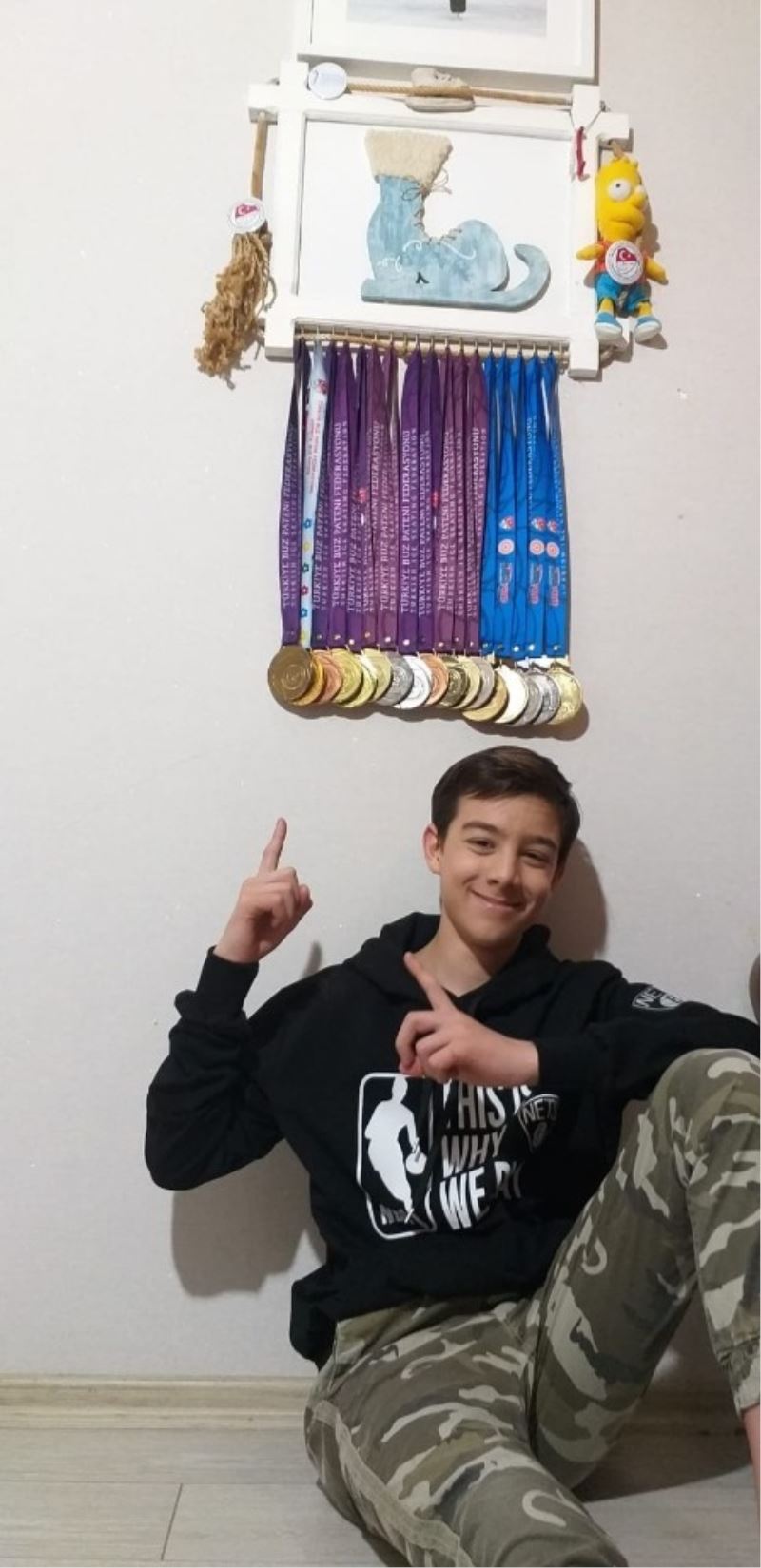 Yaşından çok madalyası var
