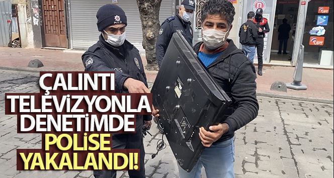 (Özel) Kucağında çalıntı televizyonla denetimde polise yakalandı
