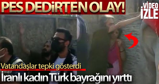 (Özel) İranlı kadın Türk bayrağını yırttı, vatandaşlar tepki gösterdi