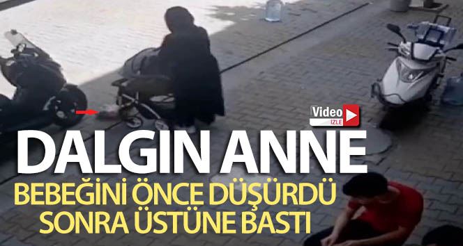 Dalgın anne, yere düşürdüğü bebeğinin üstüne bastı