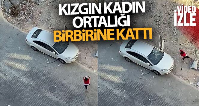 (Özel) Esenyurt’ta kızgın kadın arabayı taşa tuttu