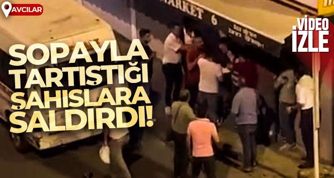 Aracından çıkardığı sopayla tartıştığı şahıslara saldırdı