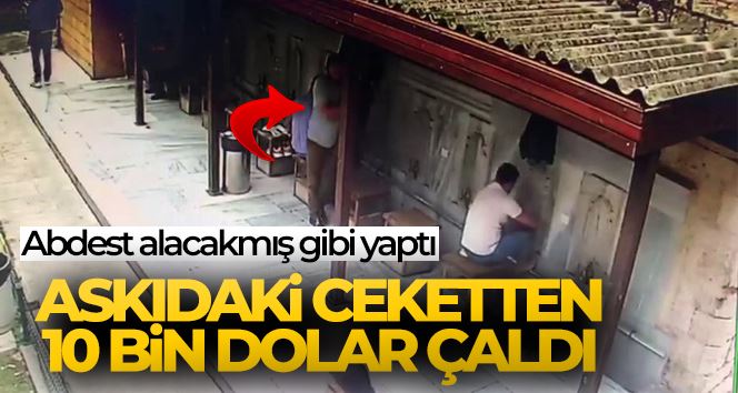 Abdest alacakmış gibi yaptı, askıdaki ceketten 10 bin dolar çaldı