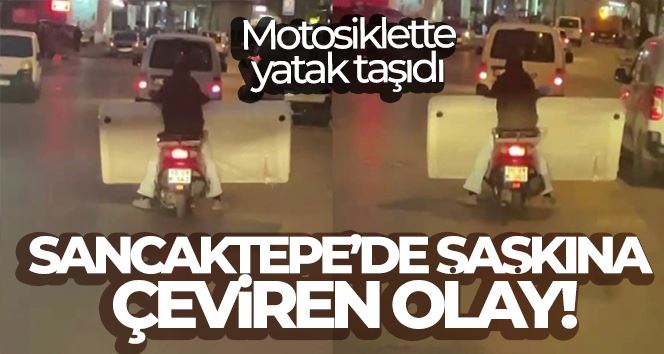 Sancaktepe’de şaşkına çeviren olay: Motosiklette yatak taşıdı