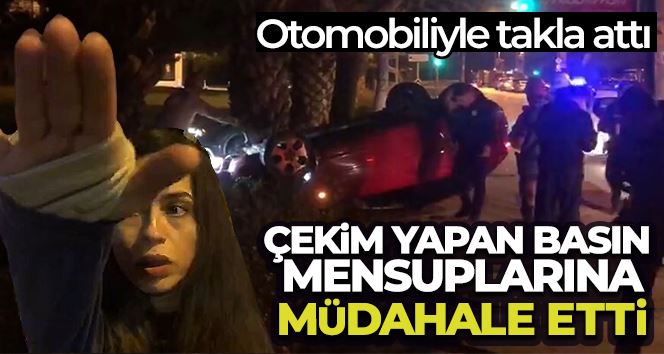 Otomobiliyle takla atan sürücü, çekim yapan basın mensuplarına müdahale etti