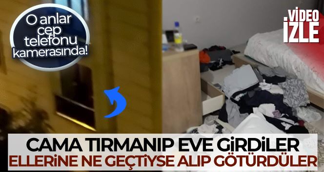 Büyükçekmece’de cama tırmanarak eve giren hırsızlar cep telefonu kamerasında