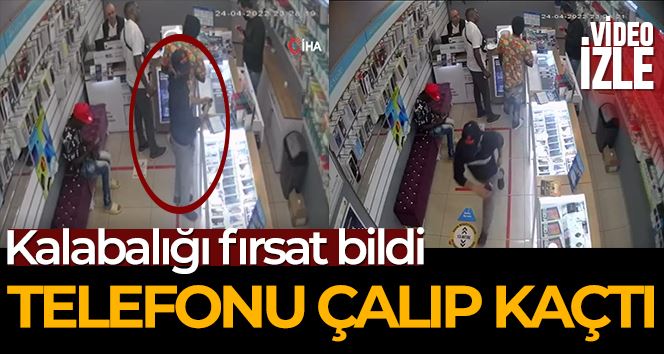 Satın almak için baktığı telefonu çalıp kaçtı