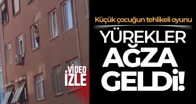 Kartal’da küçük çocuğun camdaki tehlikeli oyunu yürekleri ağza getirdi