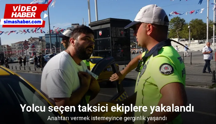 Taksim’de aracı bağlanan taksici, anahtarı polise vermek istemeyince gerginlik yaşandı